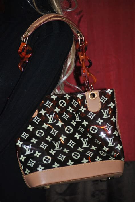 louis clear round purse.